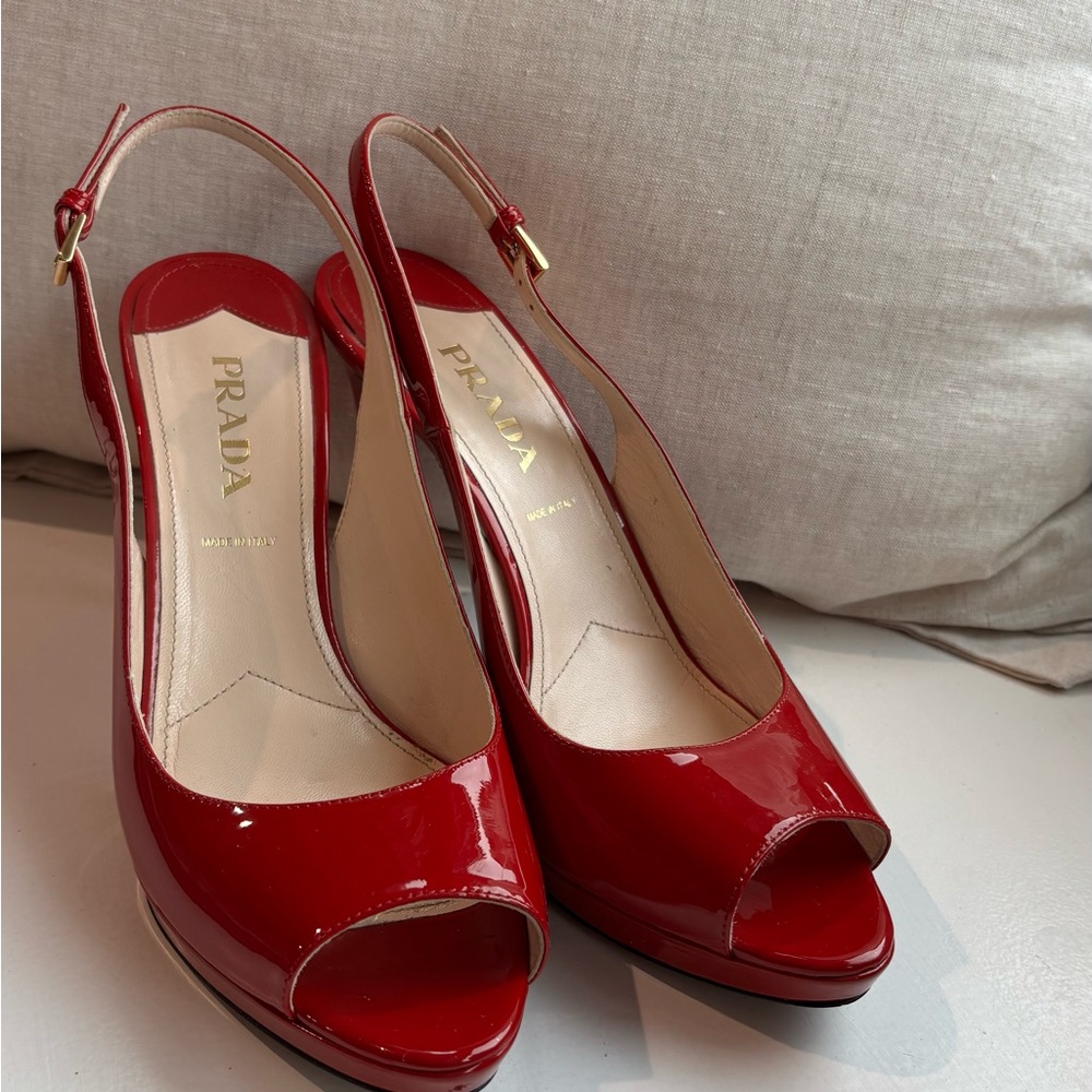 Red patent leather sling back Prada sandals. Gently used once